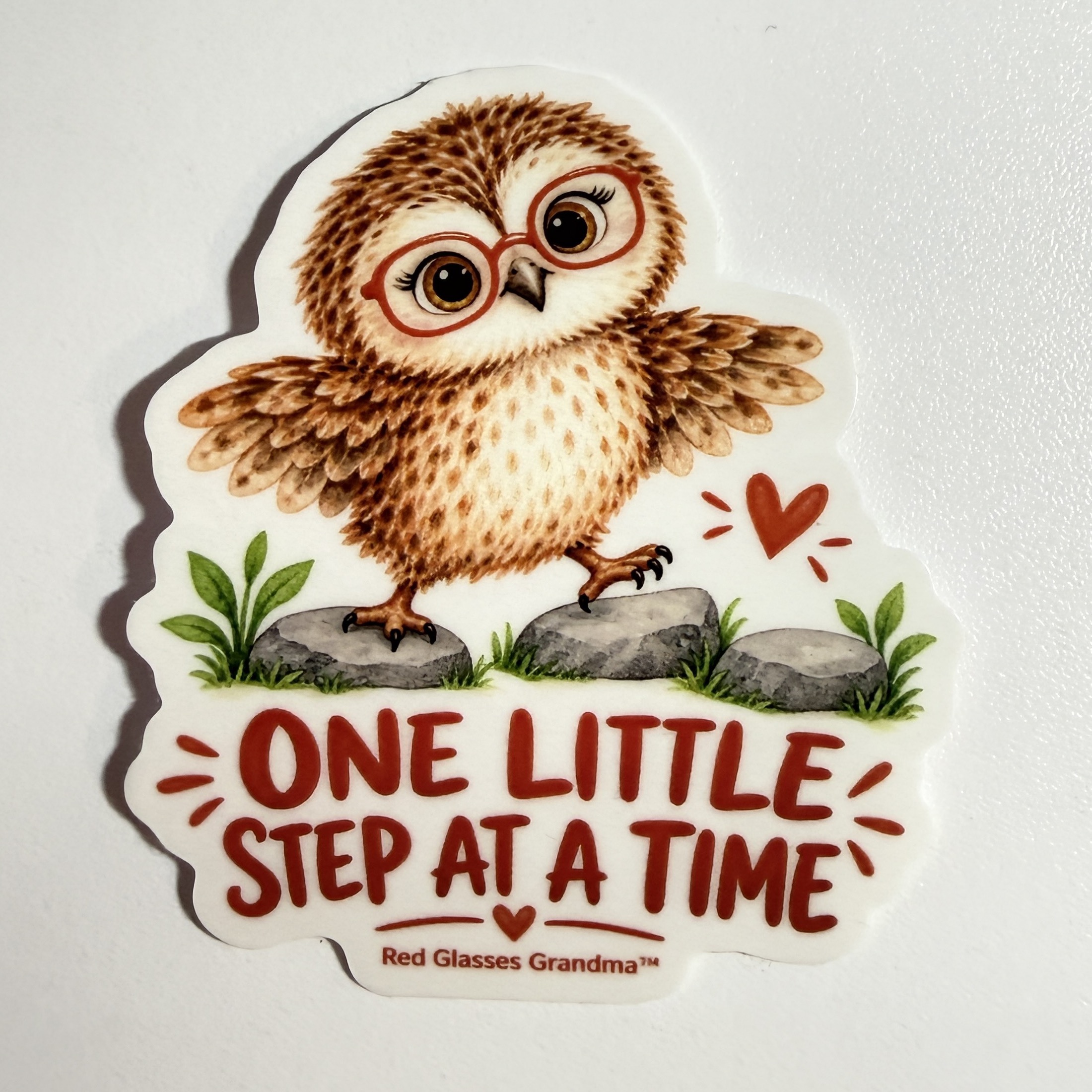 One Little Step at a Time owl sticker, with a little owl stepping across stones